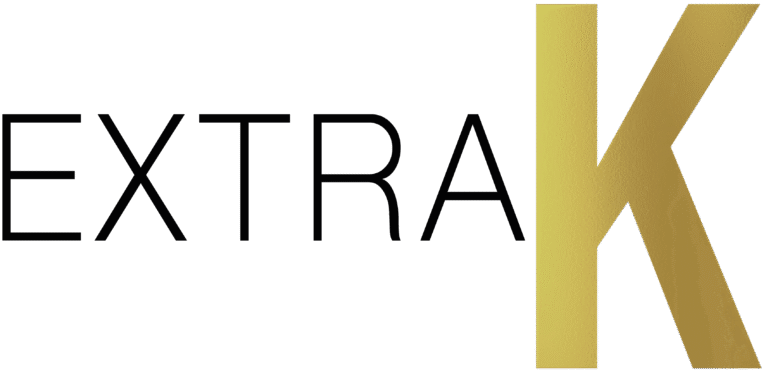 EXTRA K logo with black lettering and a gold stylized K on a transparent background
