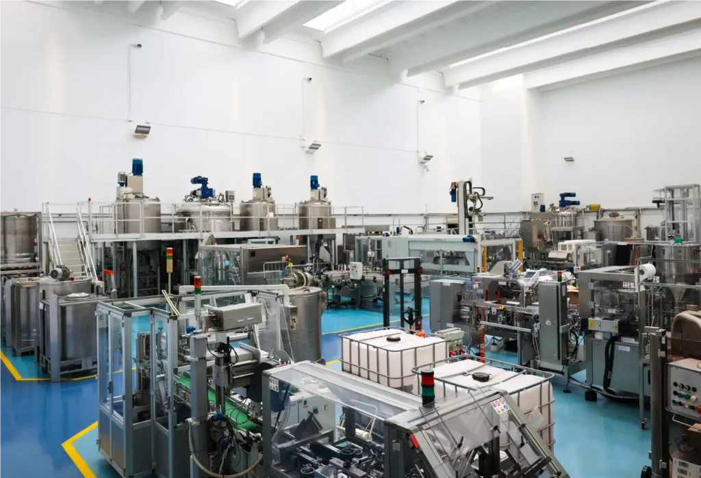 Kaaral industrial production facility with stainless steel tanks and automated machinery